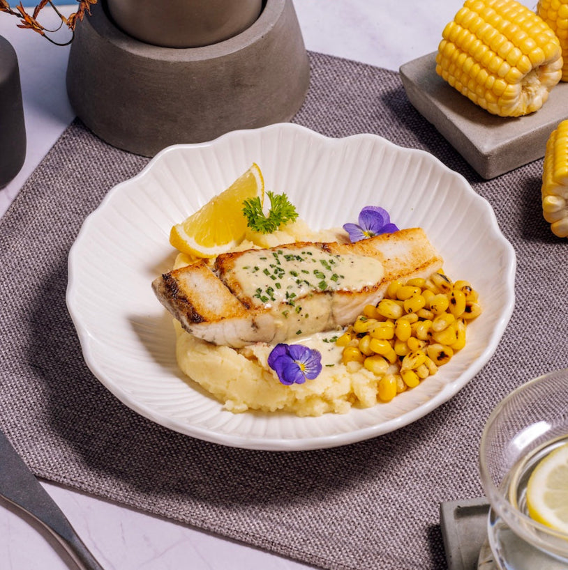 Garlic Cream Seabass with Truffle Potatoes & Grilled Corn